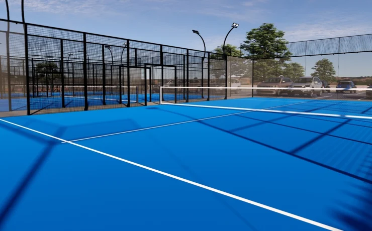 padel court outdoor with a blue surface, equipped with floodlights and glass