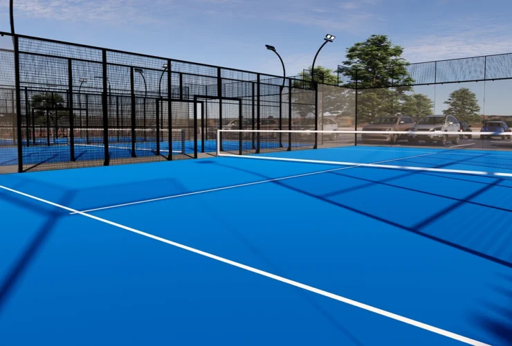 padel court outdoor with a blue surface, equipped with floodlights and glass