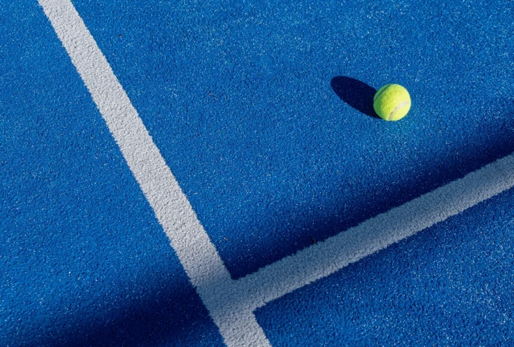 The intersection of lines and shadows on a vibrant padel court, Graphic Design
