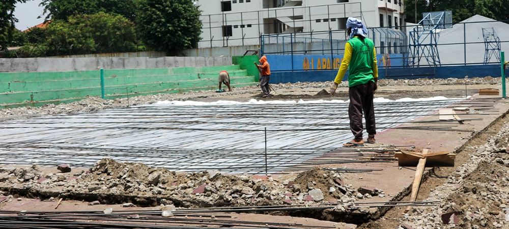 Making slab reinforcement for tennis court floors.